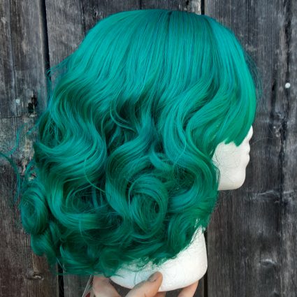 Teal fashion wig side view